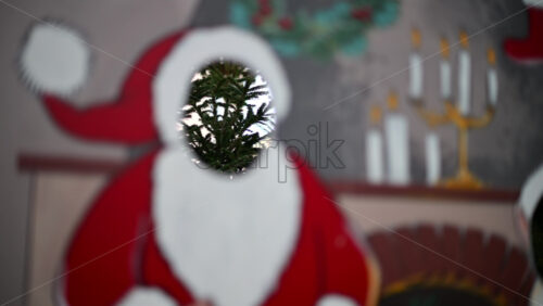 Video – Festive Christmas stand-in board featuring Santa Claus with face cut out - Starpik Stock