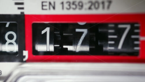 Close up of a mechanical counter displaying rotating numbers