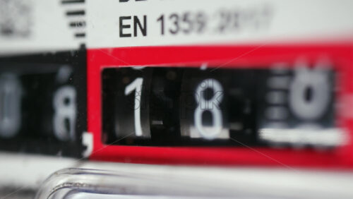 Close up of a mechanical counter displaying rotating numbers