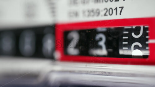 Close up of a mechanical counter displaying rotating numbers