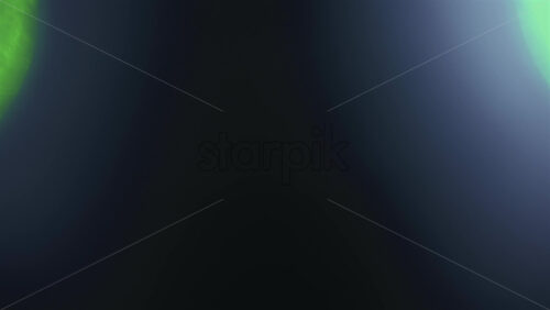 Abstract out of focus green and red lights forming soft circular bokeh shapes