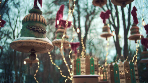 Outdoor cafe decorated with hanging ornaments, lights, and bows during winter