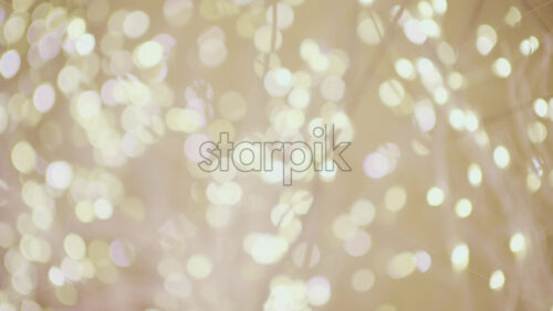 Soft defocused golden lights creating a warm bokeh background