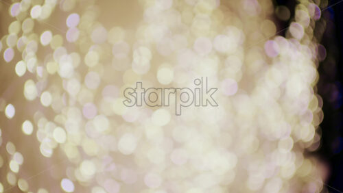Soft defocused golden lights creating a warm bokeh background