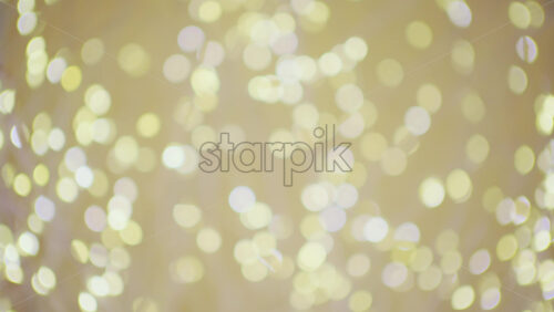Soft defocused golden lights creating a warm bokeh background