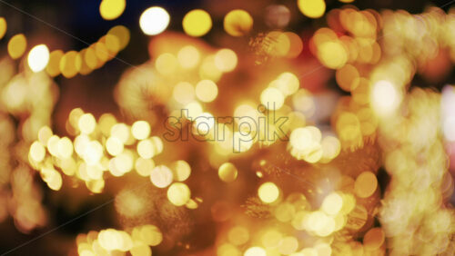 Abstract golden bokeh lights filling the frame