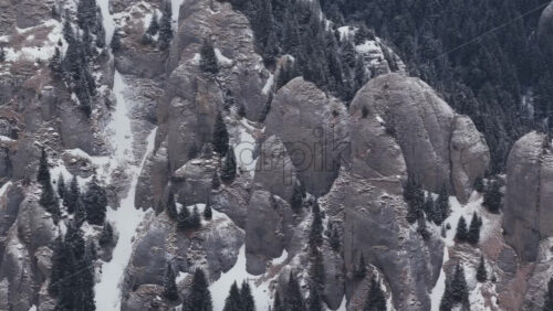 Panoramic aerial drone view of winter landscape in the mountains. Transylvania, Mount Ciucas in Romania