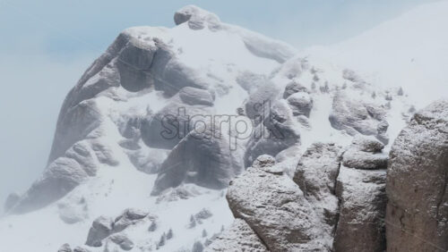 Panoramic aerial drone view of winter landscape in the mountains. Transylvania, Mount Ciucas in Romania