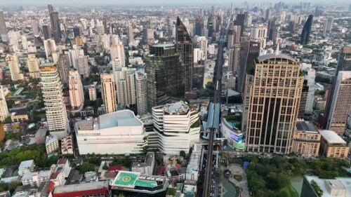 Video - Aerial drone view of modern high rise buildings and dense urban architecture in downtown Bangkok, Thailand Bangkok, Thailand - June, 6, 2025: