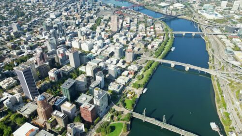 Video - Aerial drone view of downtown Portland skyline with bridges crossing the Willamette River, Oregon