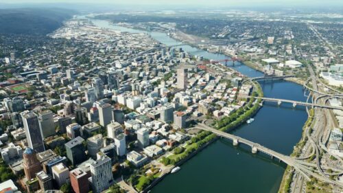 Video - Aerial drone view of downtown Portland skyline with bridges crossing the Willamette River, Oregon
