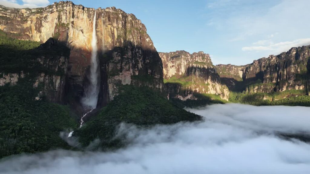 Video - Aerial drone view of Angel Falls cascading from the Auyan tepui mountain in Canaima National Park, Venezuela, the tallest waterfall in the world